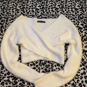Fuzzy crop cross sweater